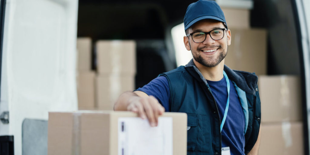 Delivery man smiling